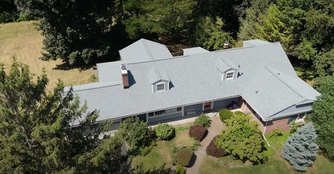 A Rochester-area home with a freshly installed Tall Pines Roofing roof