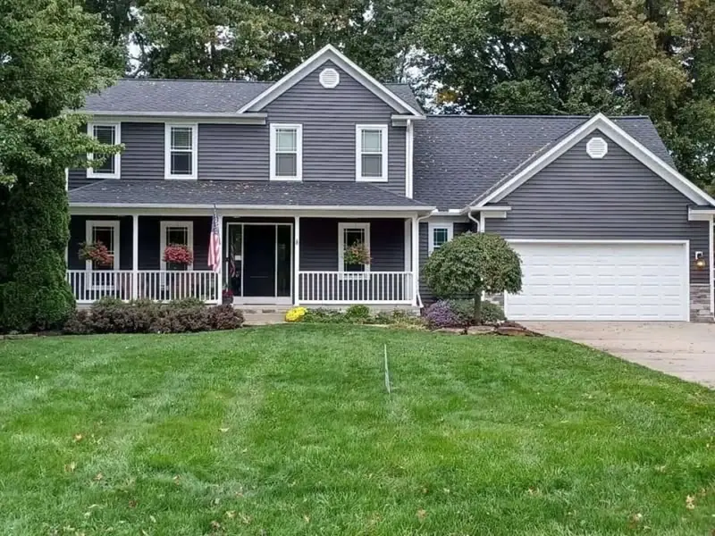 Home exterior with new siding and windows